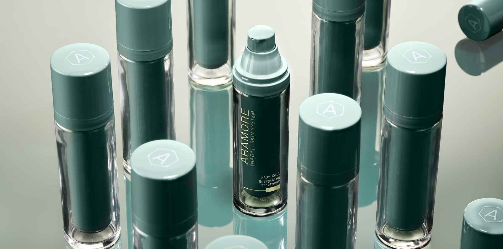 Many 30 ml Aramore NAD+ Cell energizing treatment bottles on a mirrored surface