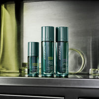 NAD+ Trio of Restoration Cream, Energizing Treatment and Eye Cream on metallic shelf with lab glass in background