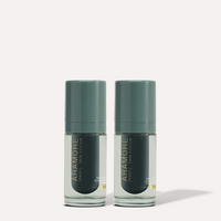 15ml Aramore NAD+ Cell Energizing Treatment bottle and 15ml Aramore NAD+ Cell Restoration Cream bottle on a cream background