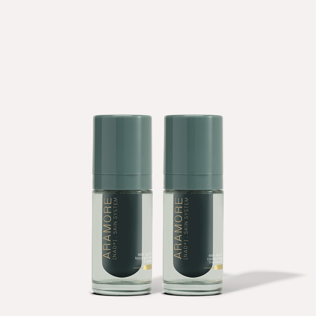 15ml Aramore NAD+ Cell Energizing Treatment bottle and 15ml Aramore NAD+ Cell Restoration Cream bottle on a cream background