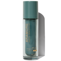 Aramore hemp serum bottle with green cap and transparent container.
